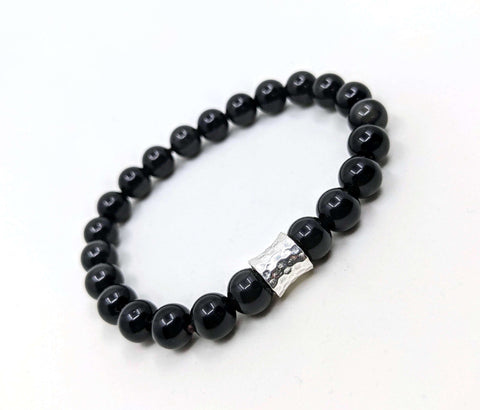 Black Obsidian bead bracelet. Our stones are Grade A quality with a stunning natural colour and shine. No dyes or pigments are used.  Made with an incredibly strong, double stretch cord.  Crafted by hand to order. Great for Stacking with other bracelets
